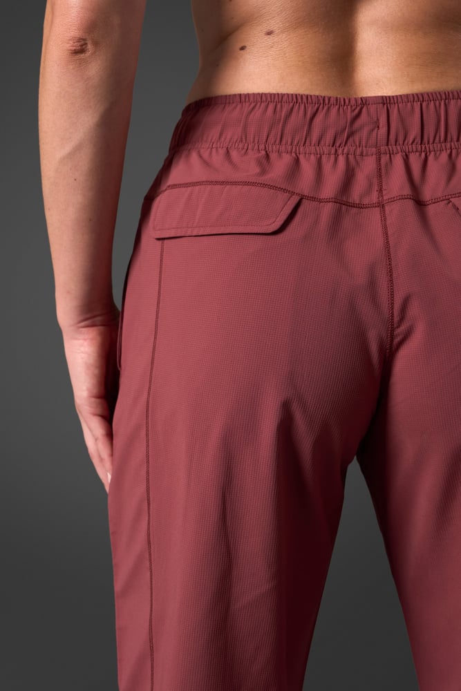 reboot pants brick red